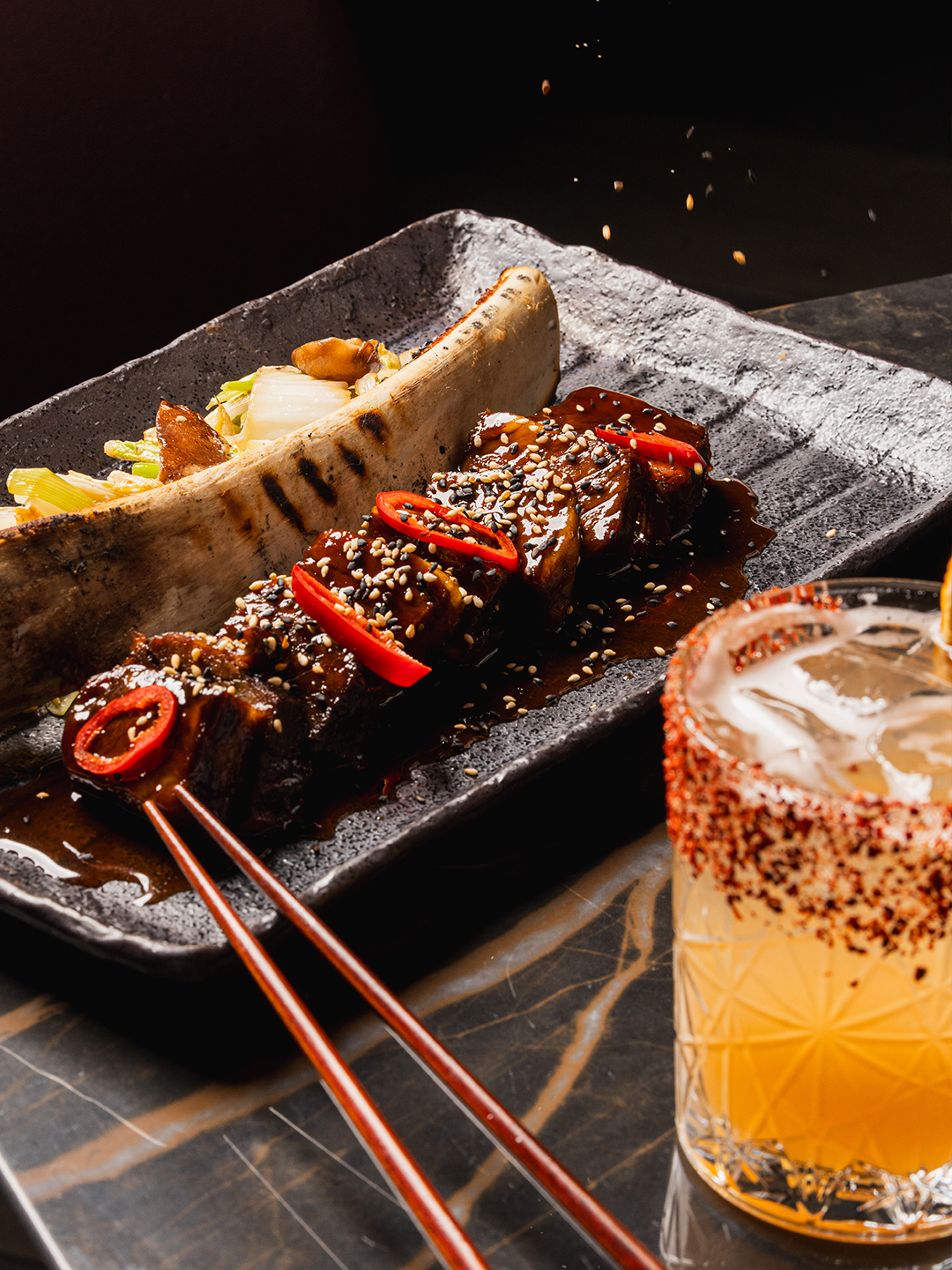 plate with food and a drink on a table