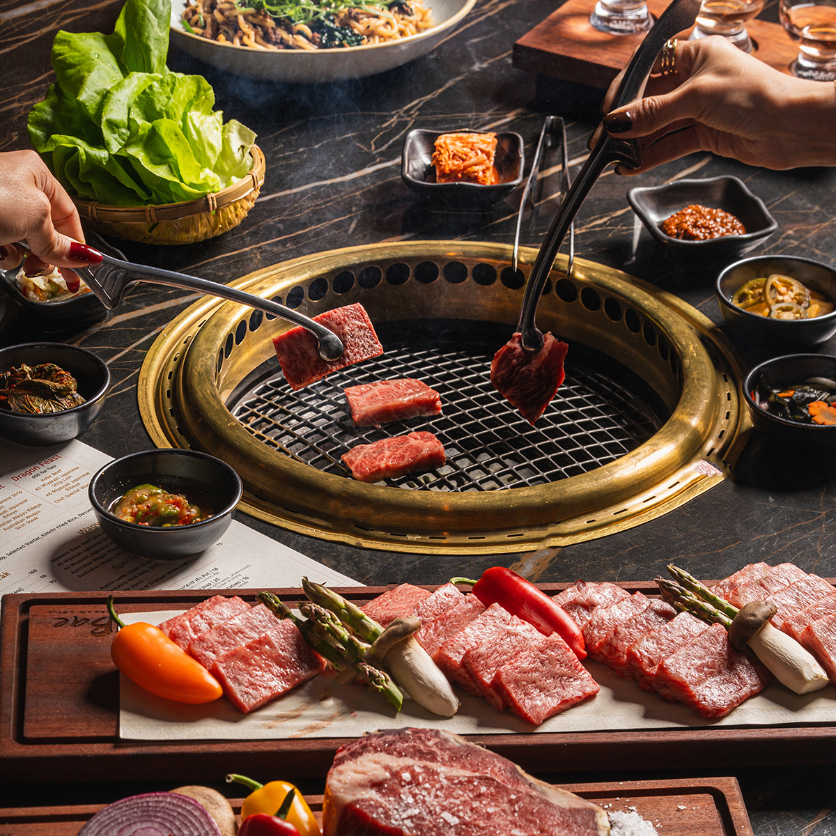 table with food at bae korean grill
